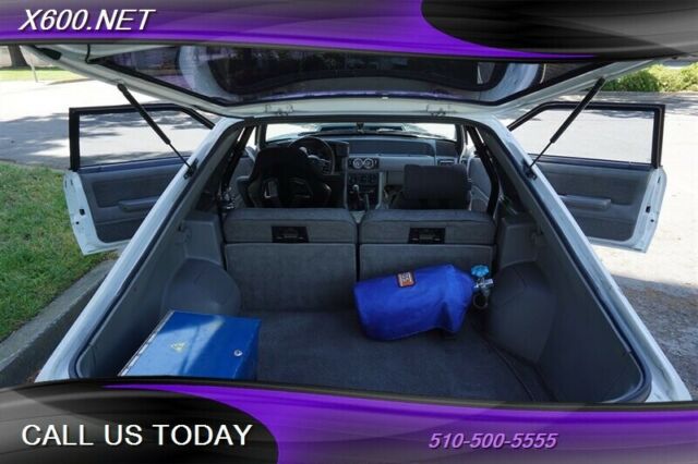 1989 White Ford Mustang --