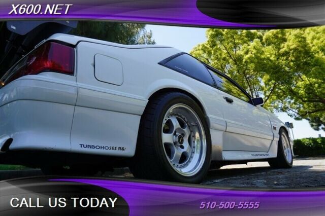 1989 White Ford Mustang --