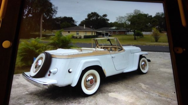1950 antique white Willys Convertible