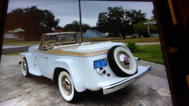 1950 antique white Willys Convertible