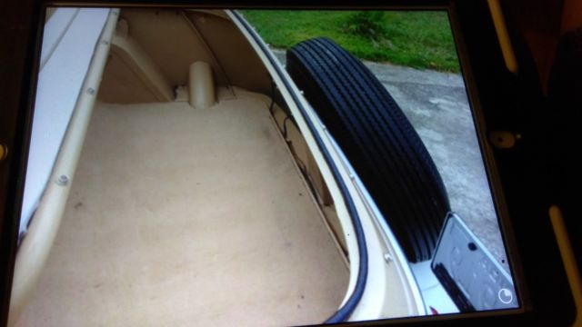 1950 antique white Willys Convertible