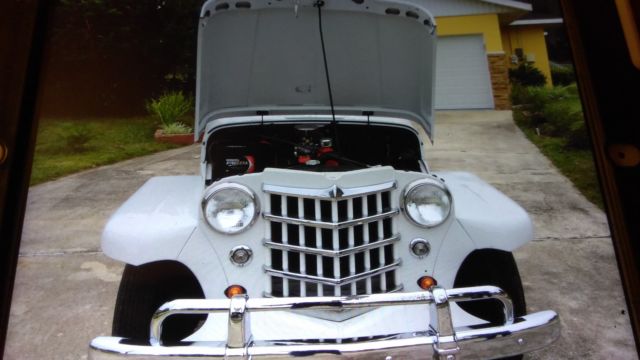 1950 antique white Willys Convertible