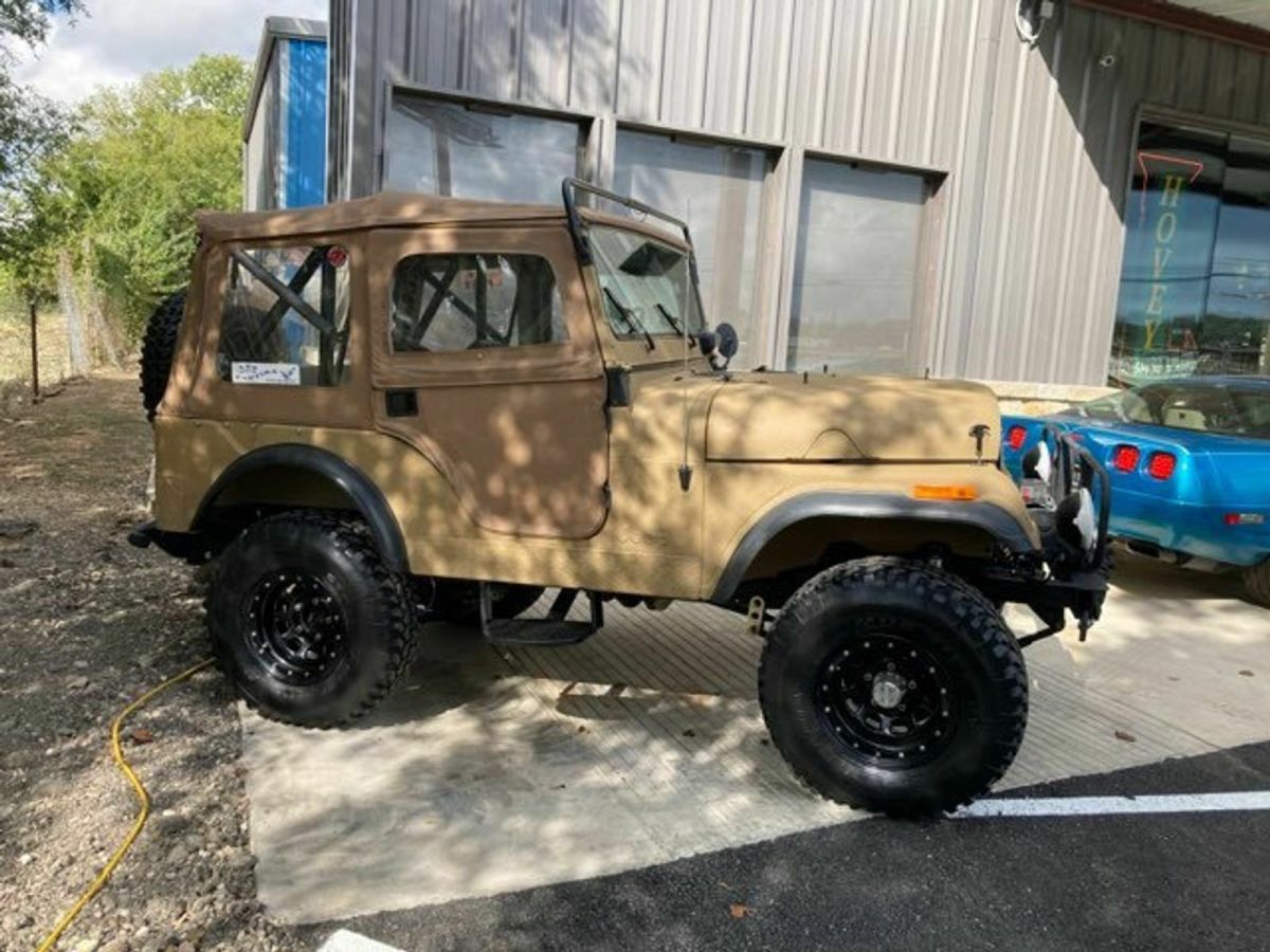 1955 Tan Willys Jeep SUV