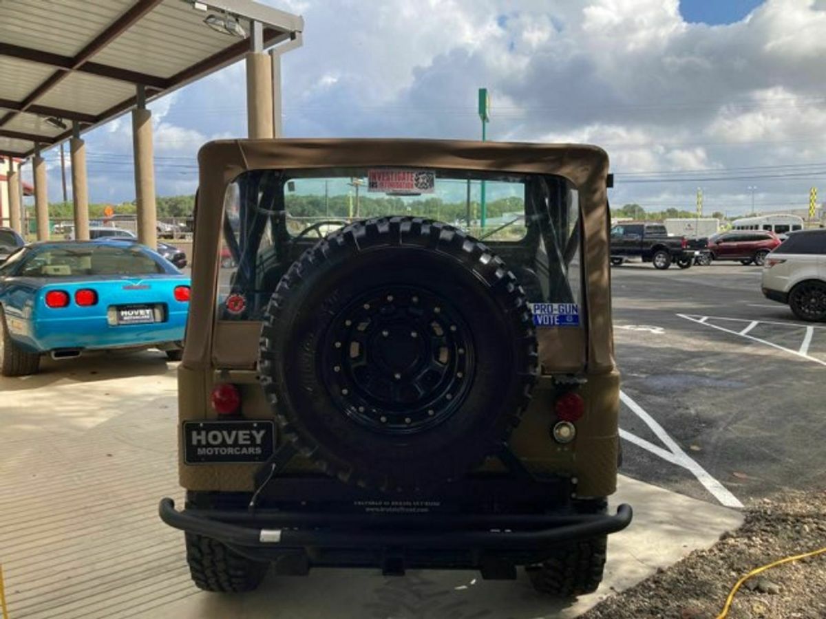 1955 Tan Willys Jeep SUV