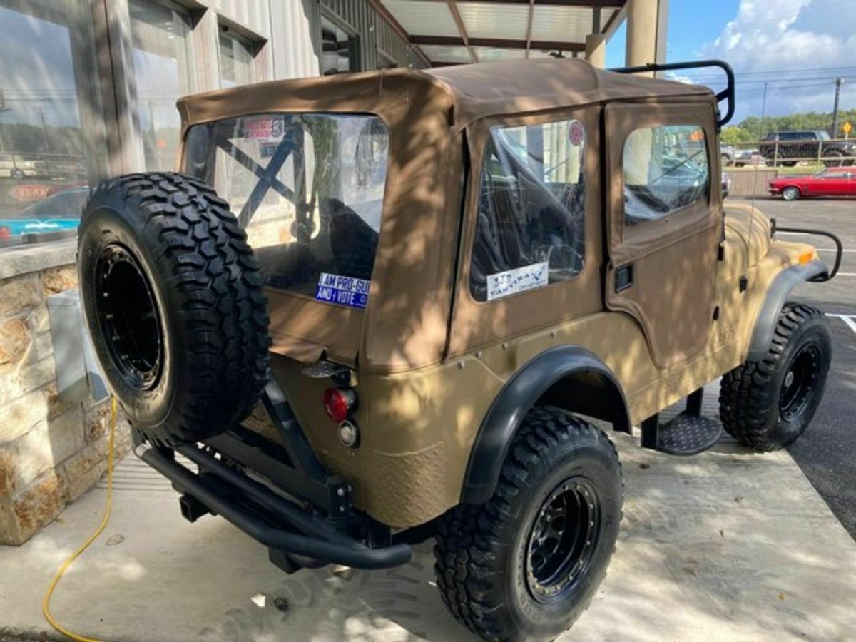 1955 Tan Willys Jeep SUV