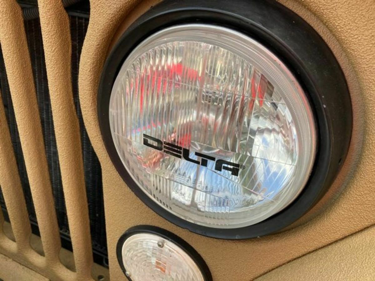 1955 Tan Willys Jeep SUV