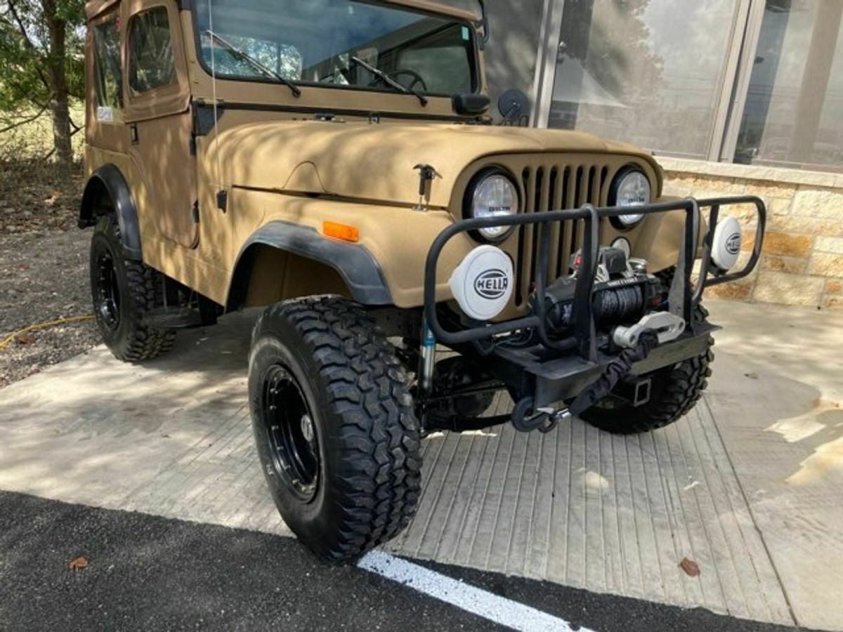 1955 Tan Willys Jeep SUV