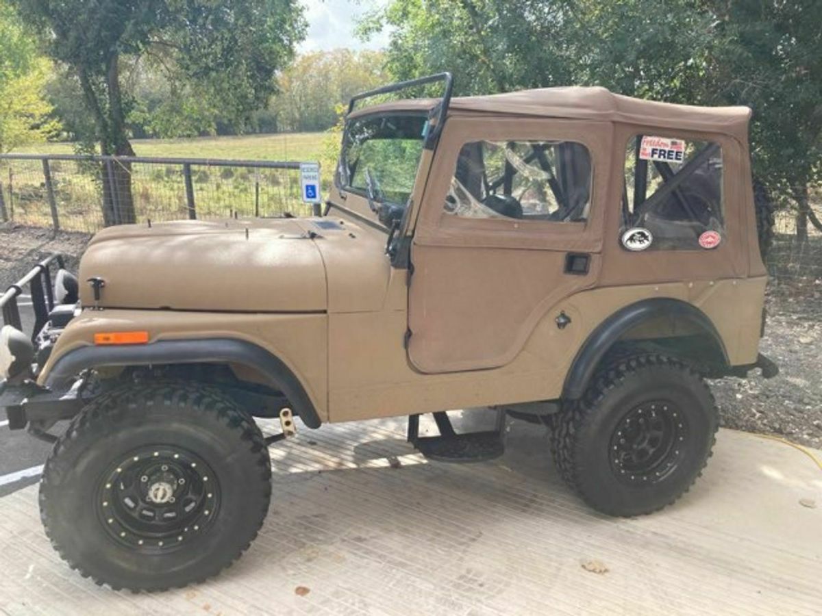 1955 Tan Willys Jeep SUV