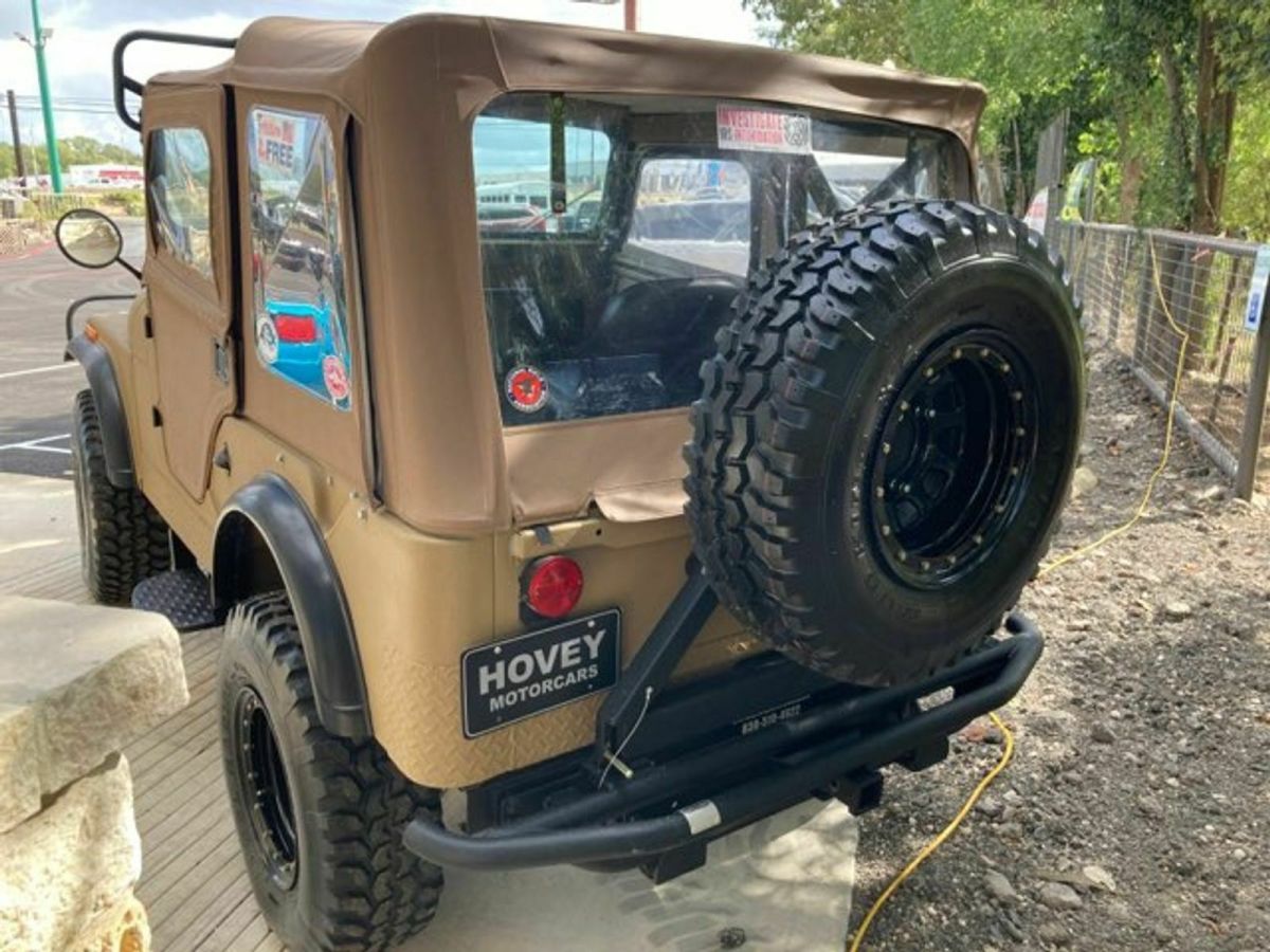 1955 Tan Willys Jeep SUV