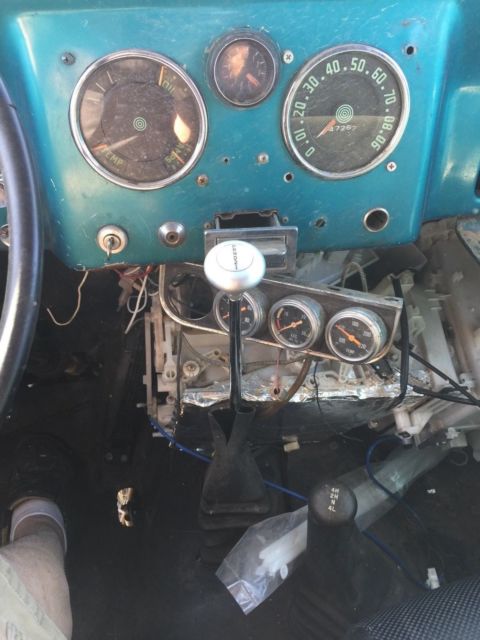 1962 teal Willys Station Wagon SUV