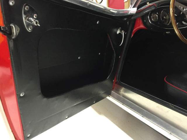 1960 red over white Austin Healey 3000 Convertible