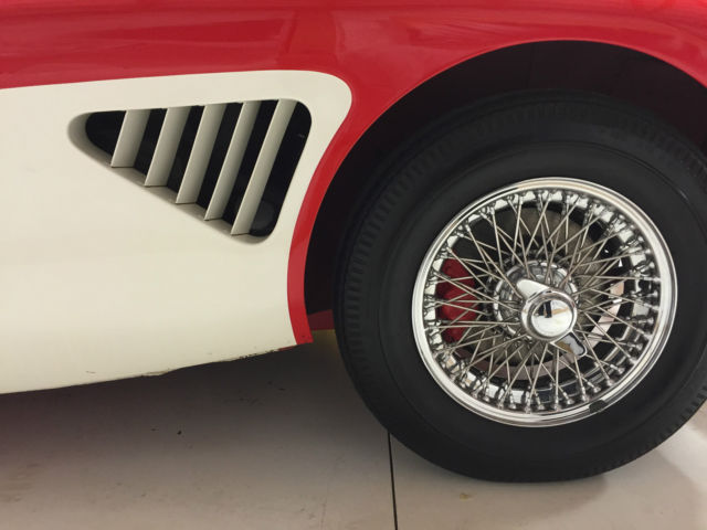 1960 red over white Austin Healey 3000 Convertible