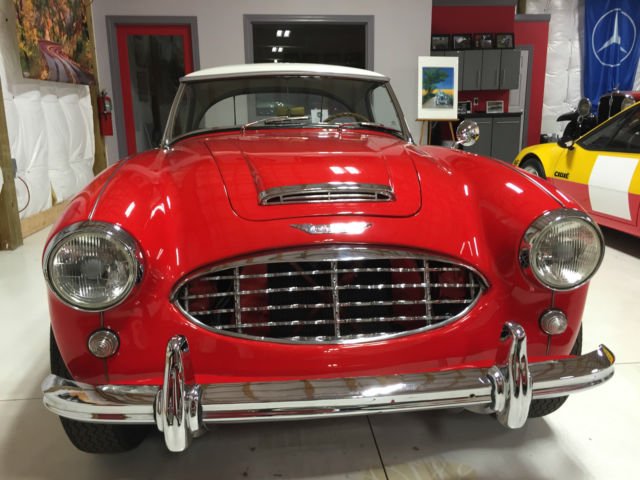 1960 red over white Austin Healey 3000 Convertible