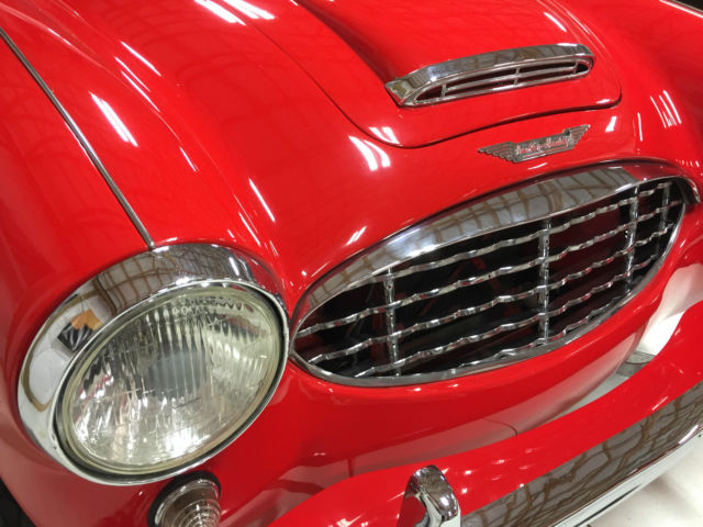 1960 red over white Austin Healey 3000 Convertible
