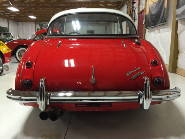 1960 red over white Austin Healey 3000 Convertible