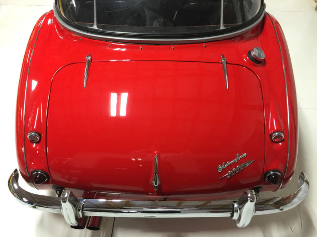 1960 red over white Austin Healey 3000 Convertible