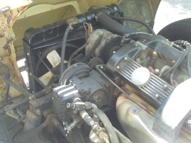 1970 Primrose Yellow Jaguar E-Type Roadster