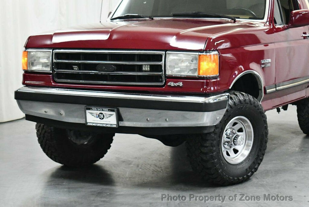 1991 Burgundy Ford Bronco SUV