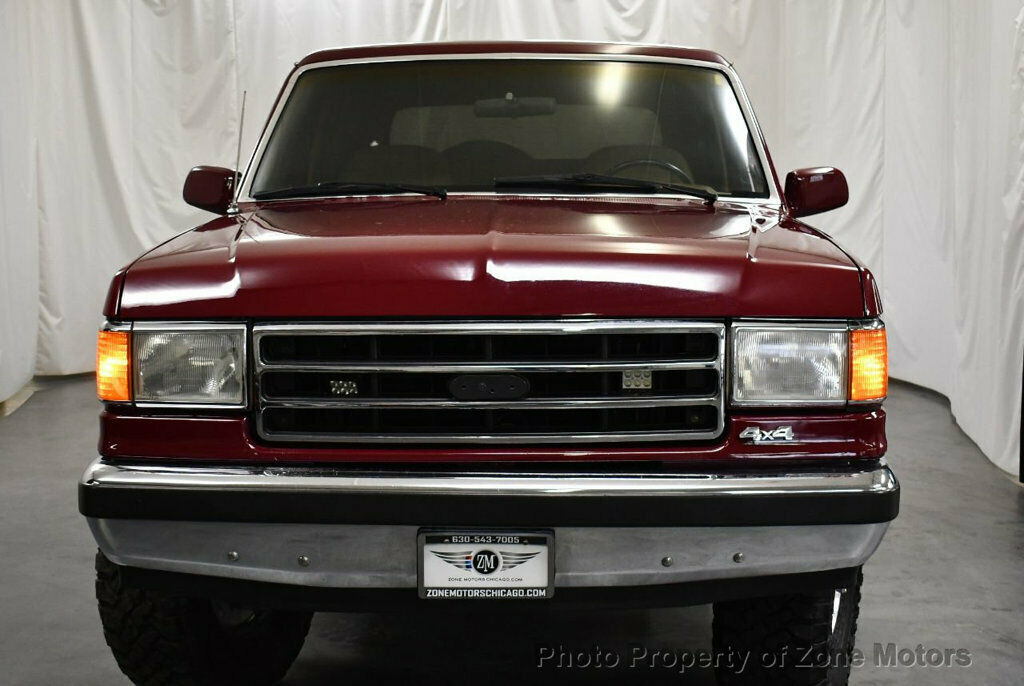 1991 Burgundy Ford Bronco SUV