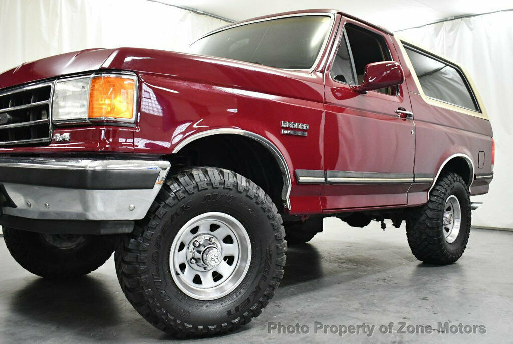 1991 Burgundy Ford Bronco SUV