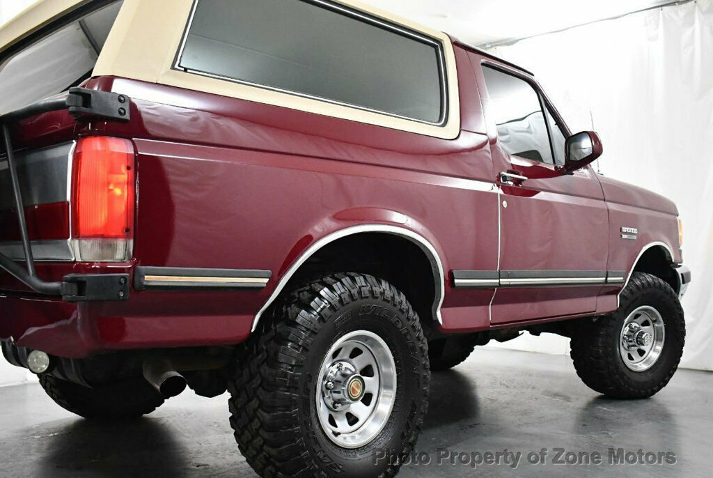 1991 Burgundy Ford Bronco SUV