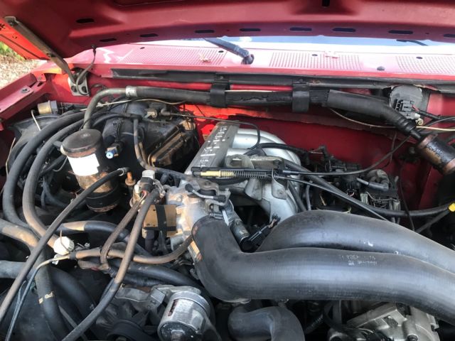 1990 Red Ford Bronco SUV