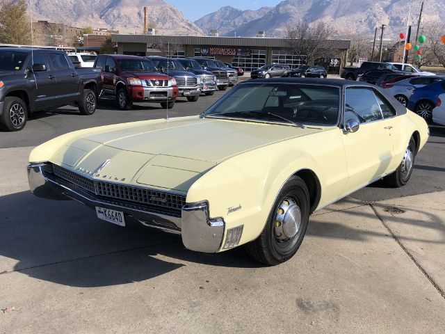1967 Yellow Oldsmobile Toronado --