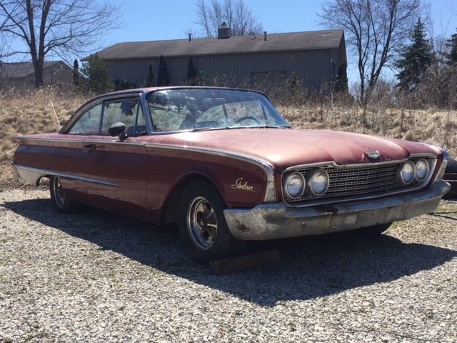 1960 Red Ford Starliner Coupe