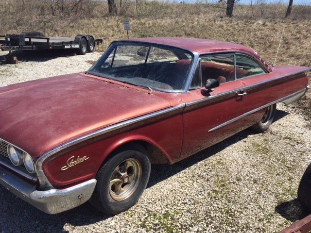 1960 Red Ford Starliner Coupe