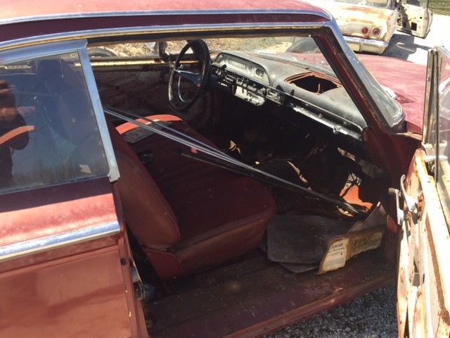 1960 Red Ford Starliner Coupe
