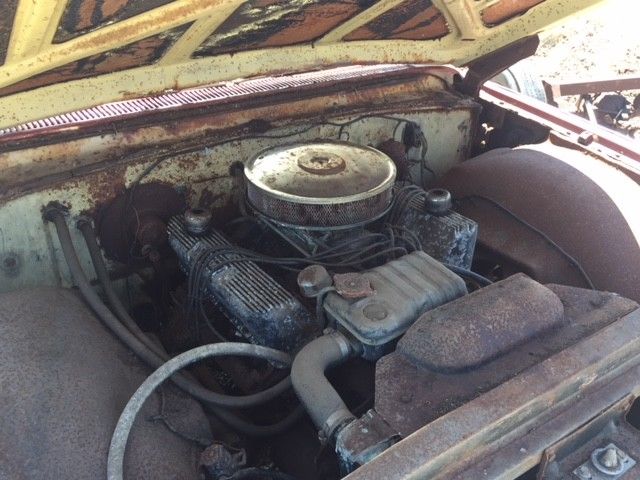 1960 Red Ford Starliner Coupe