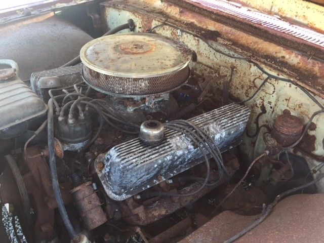 1960 Red Ford Starliner Coupe